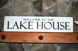 The lake sign on the fireplace mantle. Hayden Lake House Vacation Rental, Hayden Lake, Idaho