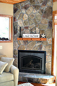 The fireplace is perfect for those cooler evenings when you want to make it cozy! Hayden Lake House Vacation Rental, Hayden Lake, Idaho