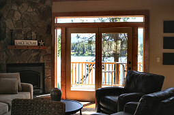 The French doors in the living room offer a beautiful view of the lake! Hayden Lake House Vacation Rental, Hayden Lake, Idaho