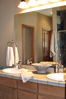 Double sinks in Master Bath makes it easier for two to get ready at the same time. Hayden Lake House Vacation Rental, Hayden Lake, Idaho